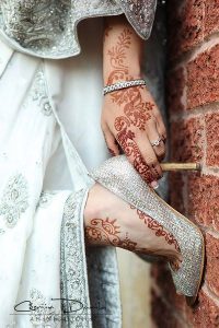 عکس هایی از طراحی با حنا روی پا
