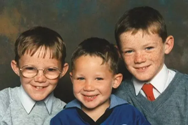 Wayne Rooney poses for a school